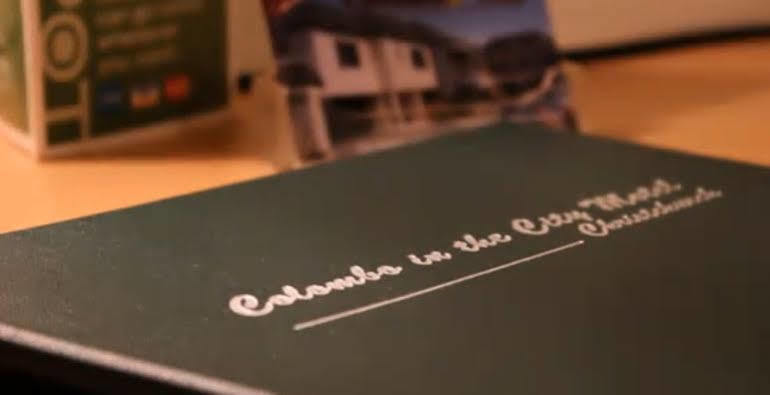 Colombo In The City Christchurch Exterior foto A book with a dedication